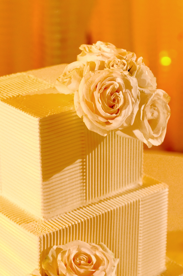 square white wedding cake with floral decoration photo by Yvette Roman Photography